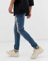 Thumbnail for your product : ASOS Design DESIGN Tall super skinny jeans in green cast blue with open rips