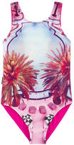 Thumbnail for your product : Molo Printed sun protection swimsuit Nika