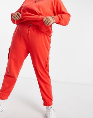 Nike Swoosh Plus fleece trackies in red