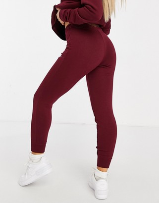 nike burgundy essentials slim joggers