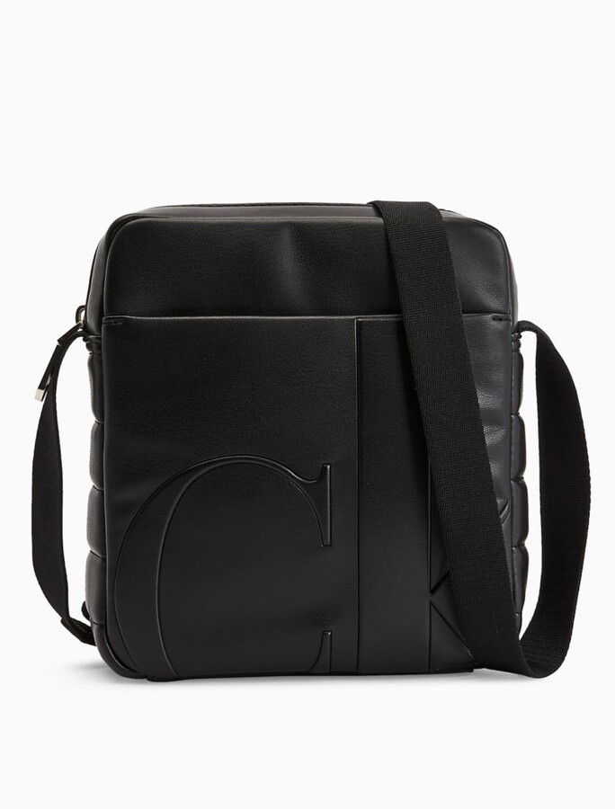 Calvin Klein Monogram Logo Reporter Crossbody Bag ShopStyle Backpacks