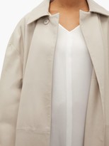 Thumbnail for your product : Raey Belted Leather Trench Coat - Light Grey