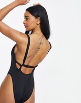 Thumbnail for your product : ASOS DESIGN Fuller Bust supportive twist strappy low back swimsuit in black