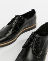 Thumbnail for your product : ASOS DESIGN brogue shoes in black leather with wedge sole