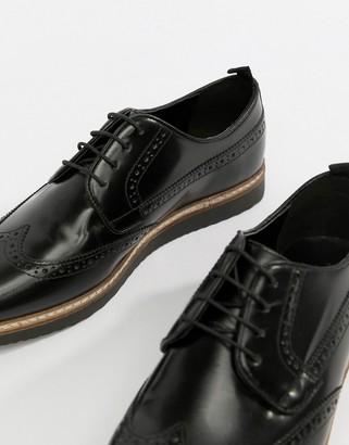 ASOS DESIGN brogue shoes in black leather with wedge sole