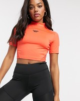 Thumbnail for your product : Reebok Classics basketball tight top in vivid orange