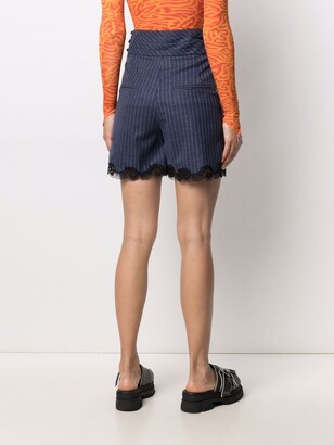 Koché High-Waisted Pinstripe Shorts