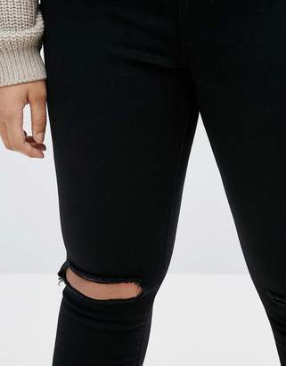 ASOS Curve Ridley Skinny Jeans In Clean Black With Rip & Destroy Busts