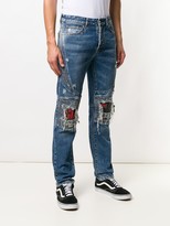 Thumbnail for your product : Marcelo Burlon County of Milan Distressed Biker Jeans