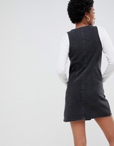 Thumbnail for your product : ASOS Tall DESIGN Tall denim button through v neck mini pinifore dress-Black