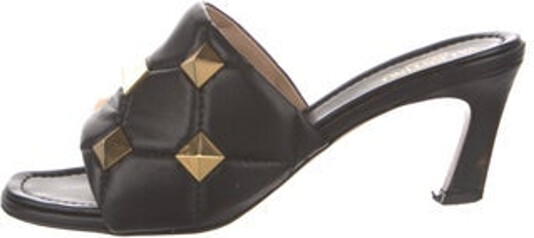 Valentino Leather Slides Black Quilted Pattern & Rockstud Accents Studded Accents Straps Includes Box & Dust Bag Unfortunately, due to restrictions, this item may not be eligible for shipping in all areas.