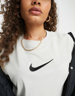 white nike shirt with silver swoosh