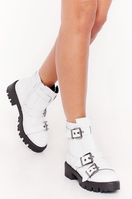 white ankle boots with buckles