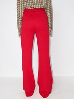 Thumbnail for your product : Gucci Interlocking G wide-leg track pants