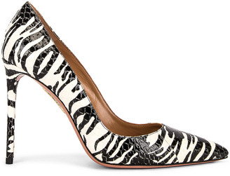 cream and black pumps