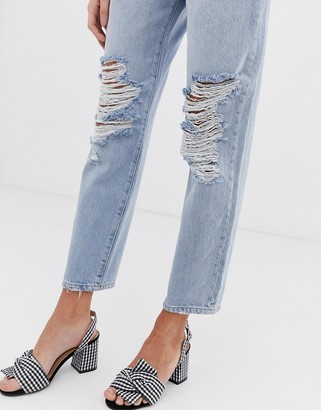 Miss Selfridge recycled denim boyfriend jeans with rips in mid wash
