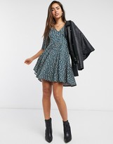 Thumbnail for your product : ASOS DESIGN mini swing dress in dark green floral print