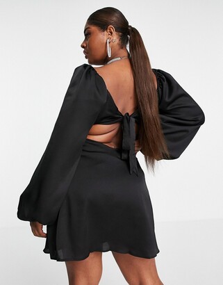 In The Style Plus x Yasmine Chanel satin cut out volume sleeve skater dress  in black - ShopStyle