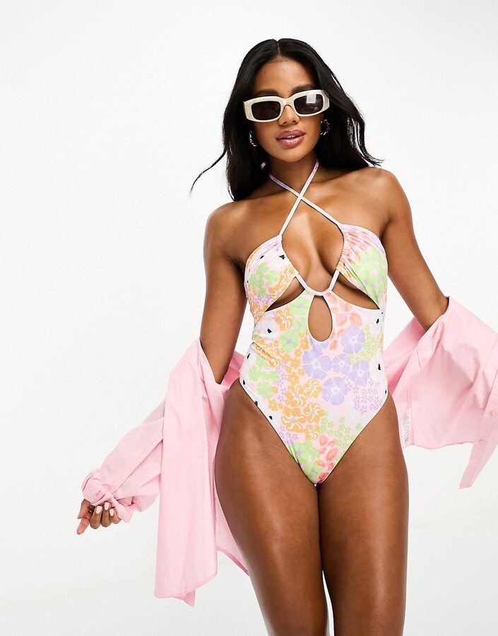 ASOS DESIGN gathered ruche cut out swimsuit in pastel ditsy floral -  ShopStyle