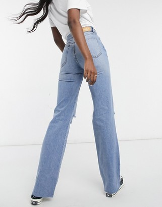 Stradivarius Tall straight leg 90s jeans with rips in blue - ShopStyle