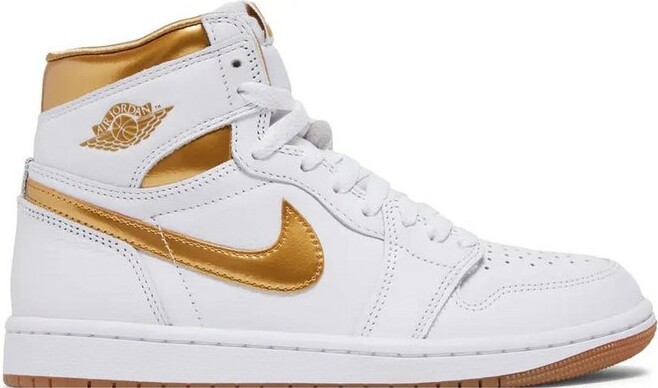 gold nikes for men