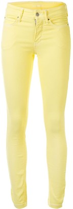 yellow stretch jeans