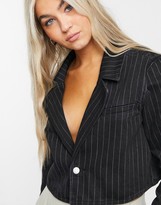 Thumbnail for your product : Weekday Verdin organic cotton pinstripe cropped boxy denim jacket in black