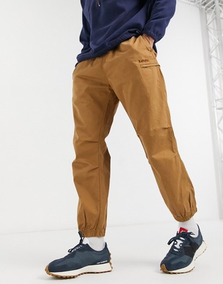 Levi's marine cargo drawstring cuffed jogger trousers in desert boot beige  - ShopStyle