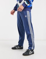 Thumbnail for your product : adidas Firebird tracksuit bottoms in night marine