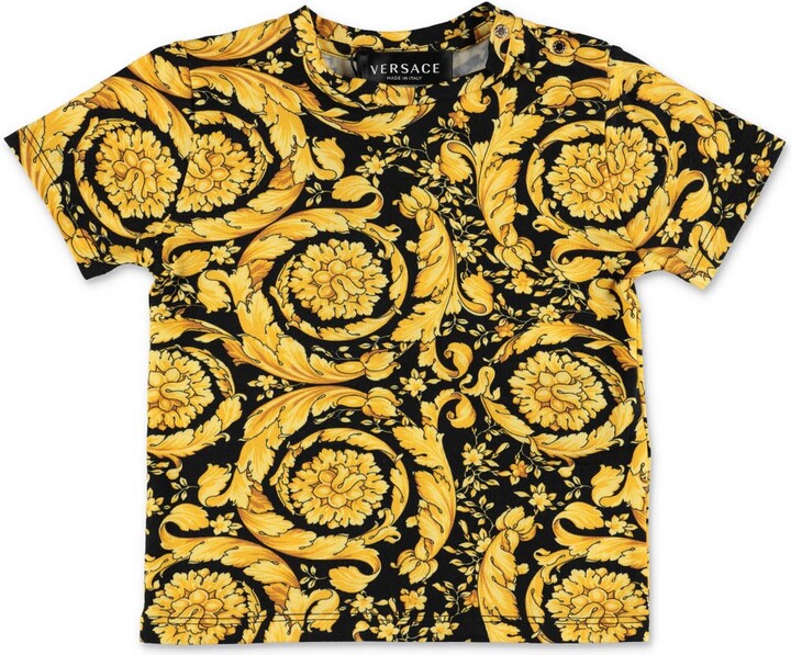 Mode Hauts T-shirts en mailles tricotées Gianni Versace T-shirts en mailles tricot\u00e9es lettrage imprim\u00e9 