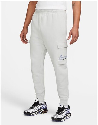 Nike 3D Swoosh fleece cargo joggers in grey - ShopStyle Trousers