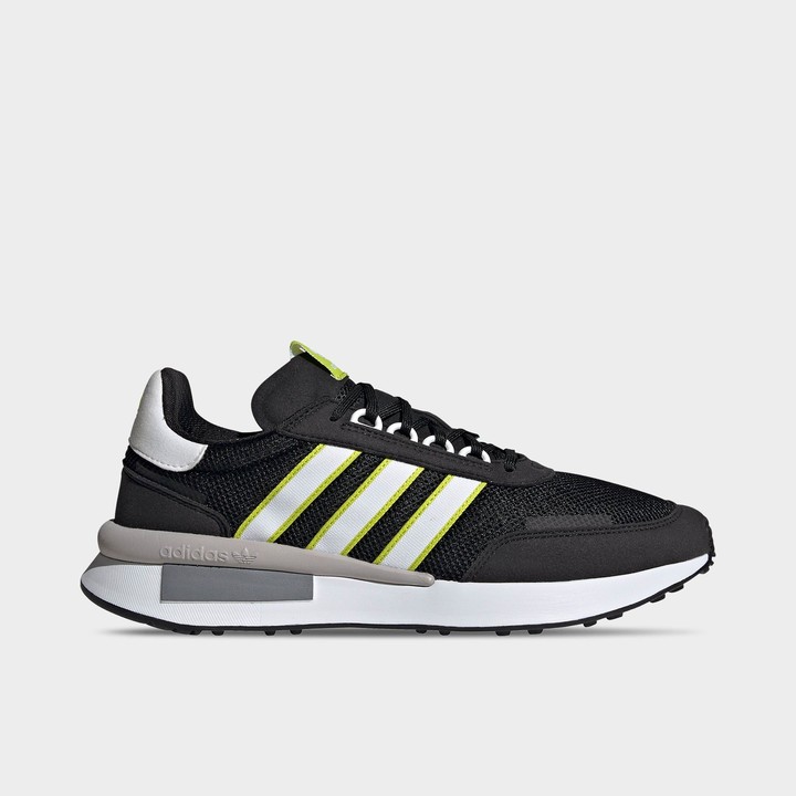 white adidas shoes with green