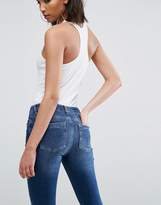 Thumbnail for your product : ASOS DESIGN Lisbon midrise skinny jeans in kyla wash with raw hem