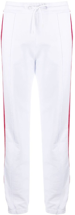 white trousers with red stripe