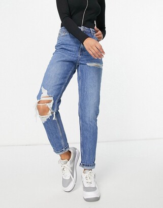 Topshop mom jeans with knee and thigh rips in mid blue - ShopStyle