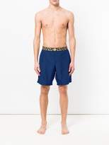 Thumbnail for your product : Versace Greek Key waistband swim shorts