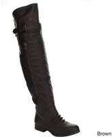 ladies in thigh high leather boots
