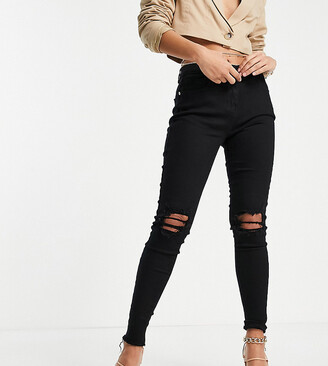 Parisian skinny jeans with ripped knee in black - ShopStyle