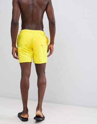 ASOS Design DESIGN swim shorts in retro purple & yellow mid length 2 pack multipack saving