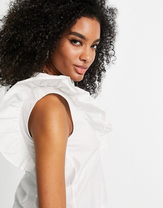 ASOS DESIGN sleeveless shirt with frill detail in cotton in white -  ShopStyle Tops