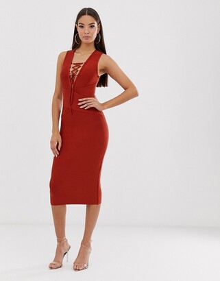 The Girlcode bandage dress with tie detail in rust