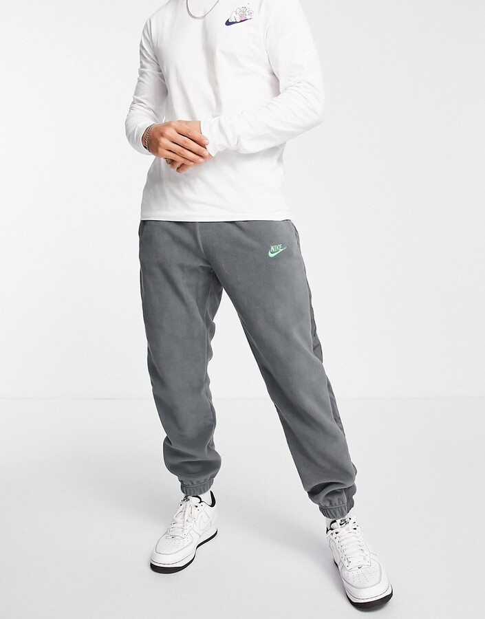 Nike Sport Essentials polar fleece cuffed sweatpants in gray - ShopStyle  Activewear Pants