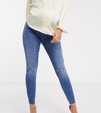 ASOS DESIGN Maternity high rise ridley 'skinny' jeans in mid wash blue with rips with over the bump band