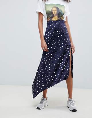 ASOS Design DESIGN asymmetric satin midi skirt in navy spot