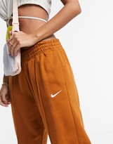 Thumbnail for your product : Nike mini swoosh oversized joggers in tawny brown
