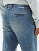 Thumbnail for your product : Kuro Pleated Selvedge-denim Jeans - Blue