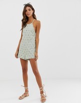 Thumbnail for your product : ASOS DESIGN palm broderie playsuit with cross strap open back