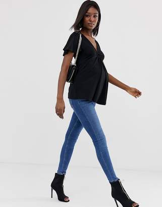 ASOS Maternity DESIGN Maternity top with angel sleeve and ring detail
