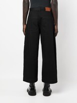 Thumbnail for your product : Studio Nicholson Puch cropped wide-leg jeans
