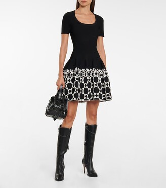 Alaia Studded leather knee-high boots